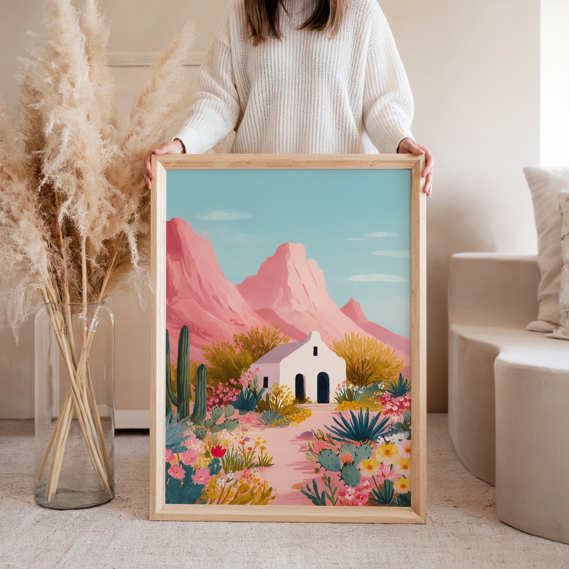 Framed pastel desert house with blooming flowers and mountains, Desert Bloom art print on wall, kids room wall art