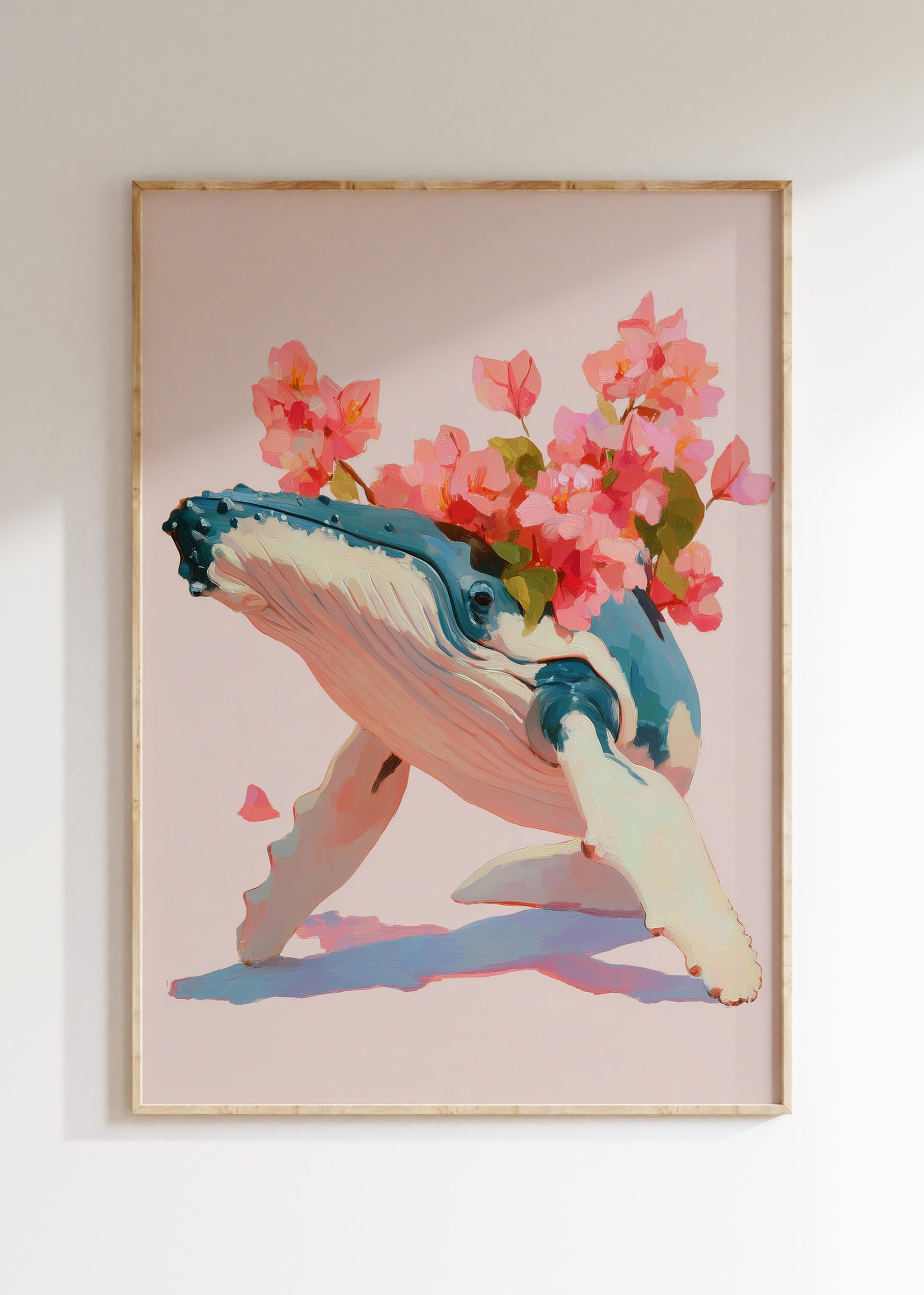 Framed whale ocean illustration in deep blue and pink tones, marine life poster on wall, home decor wall art